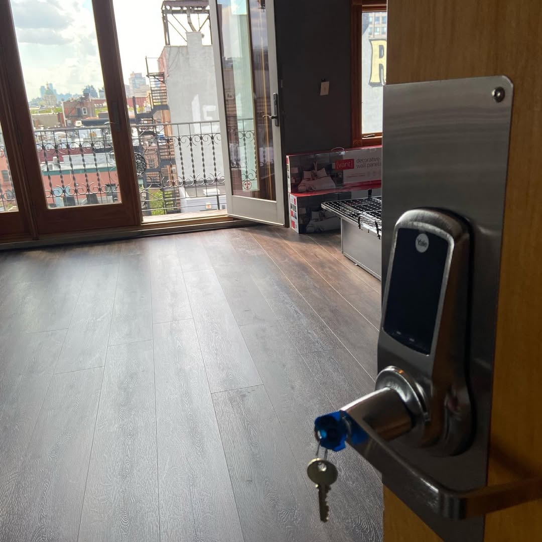 Wireless door access control lock installed on a door
