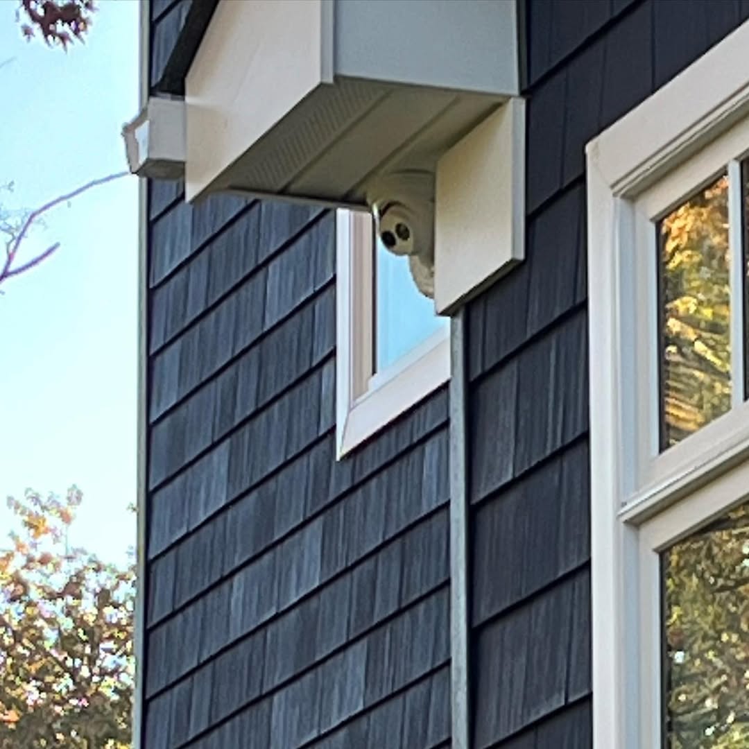Commercial surveillance camera installed on a building exterior